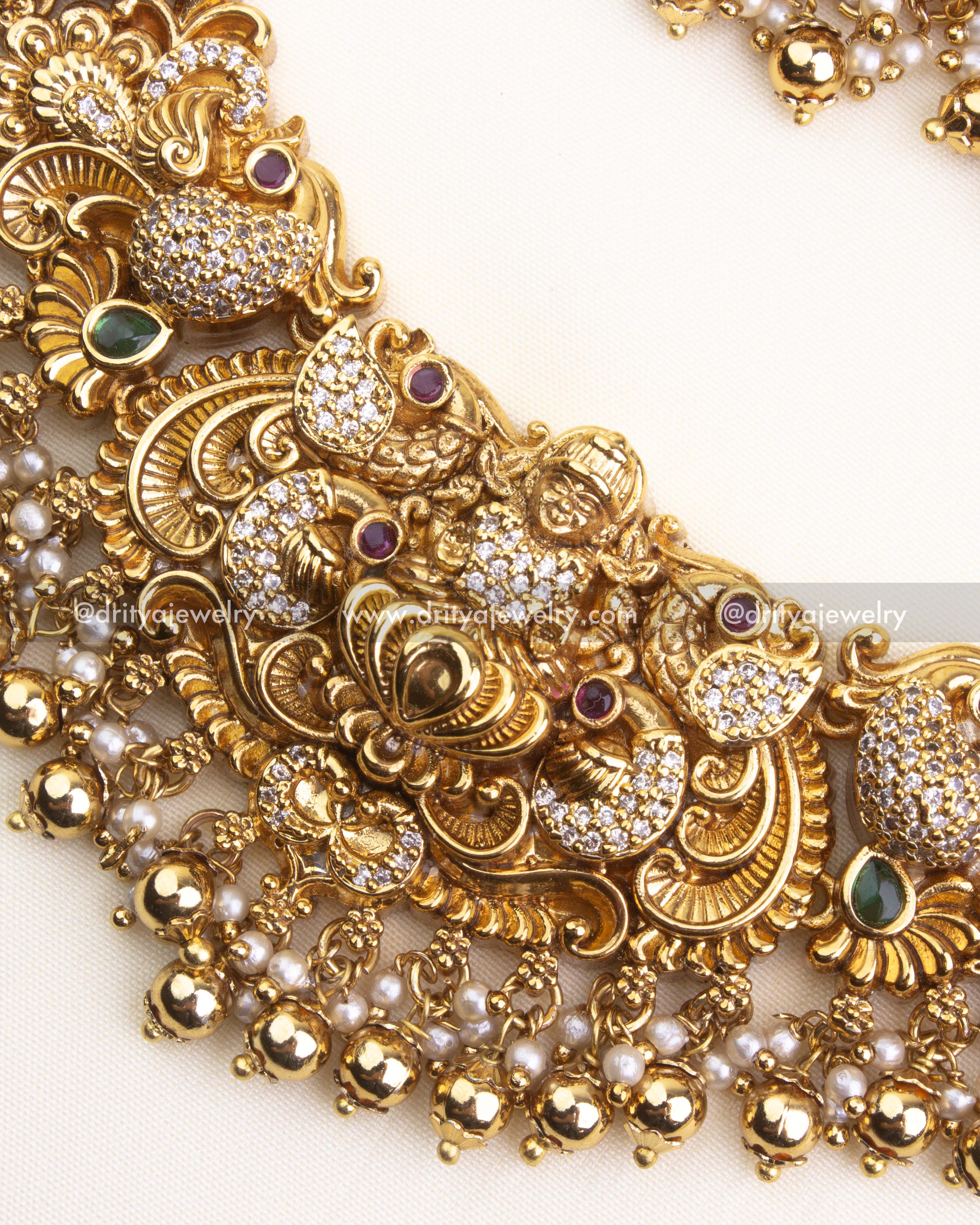 700-GGO - Necklace Set - Center close-up of god idol motif and stone-studded detailing