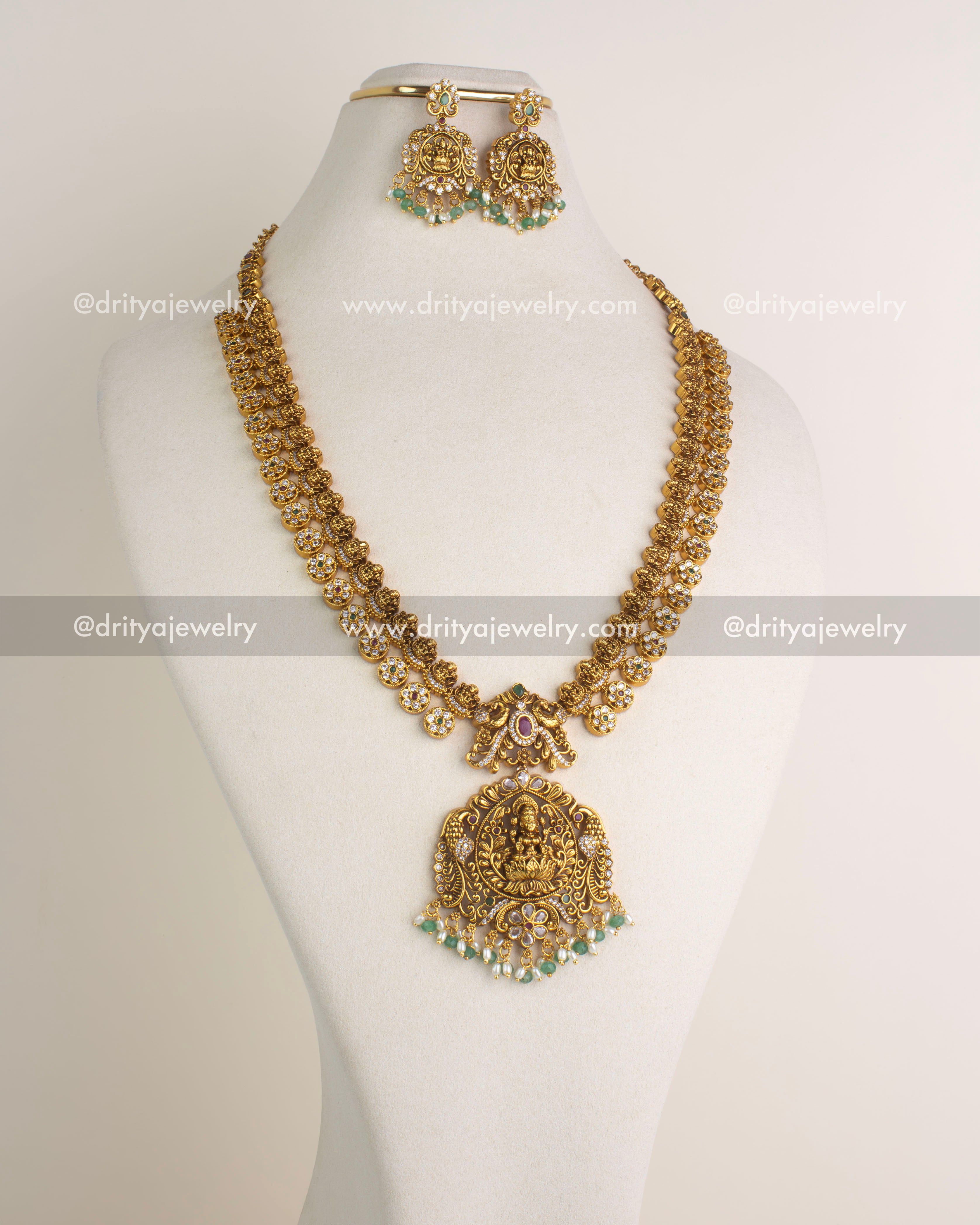 SKU 1186 Necklace Set full view of nakshi long god idol necklace with matching earrings on bust