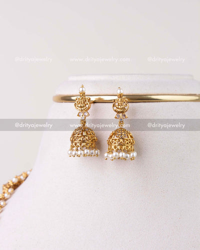 1279-G matching small gold replica jhumka earrings with pearl drops close-up