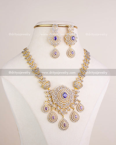 1229-PU Complete short necklace set with matching dangler earrings on display
