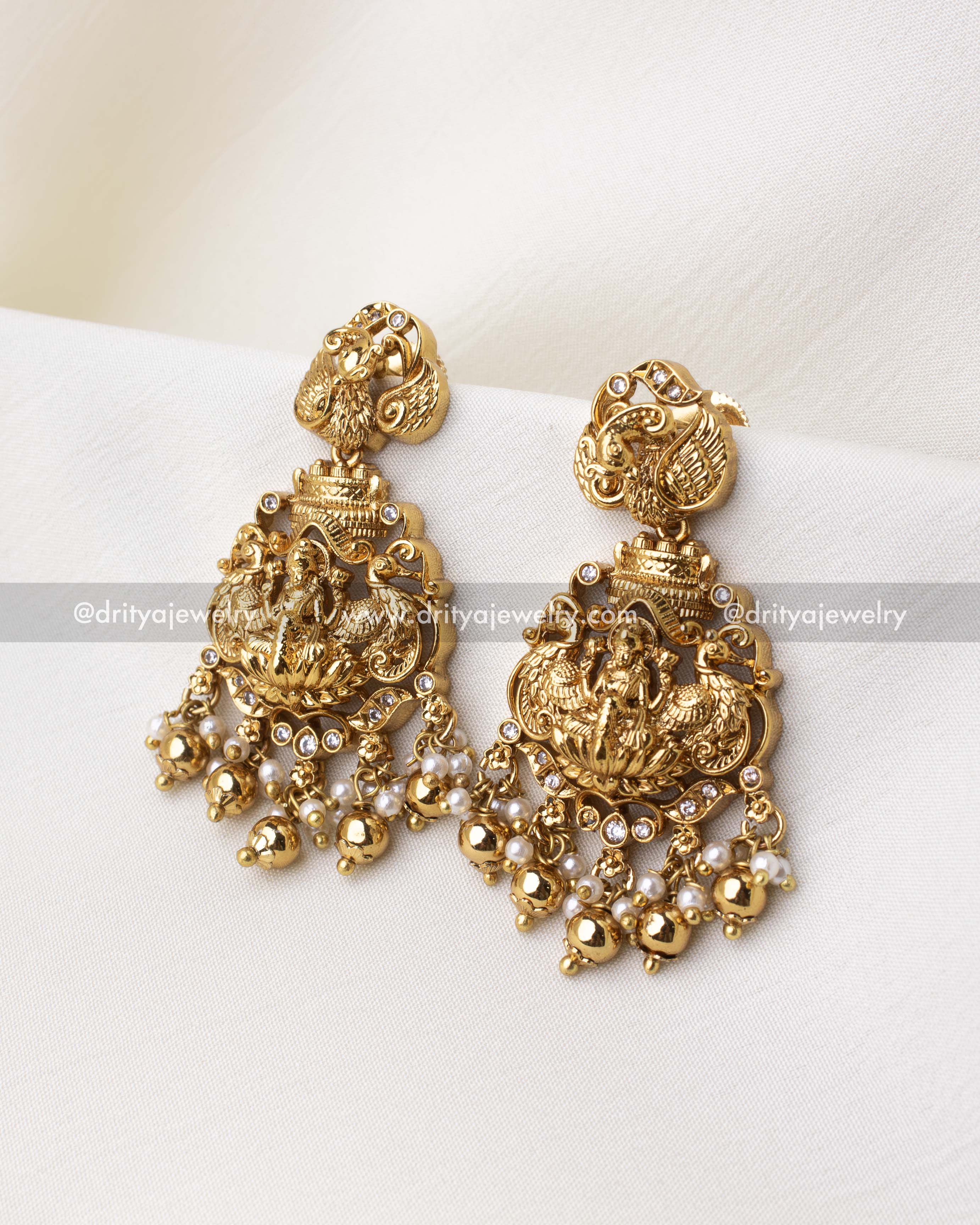 1263-GO temple-style god idol earrings with pearl and gold ball hangings front view