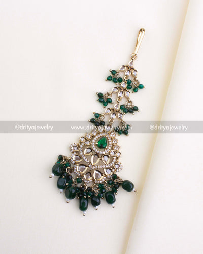 1133-G bridal emerald maang tikka full view showing cascading green beads and stone-studded centerpiece