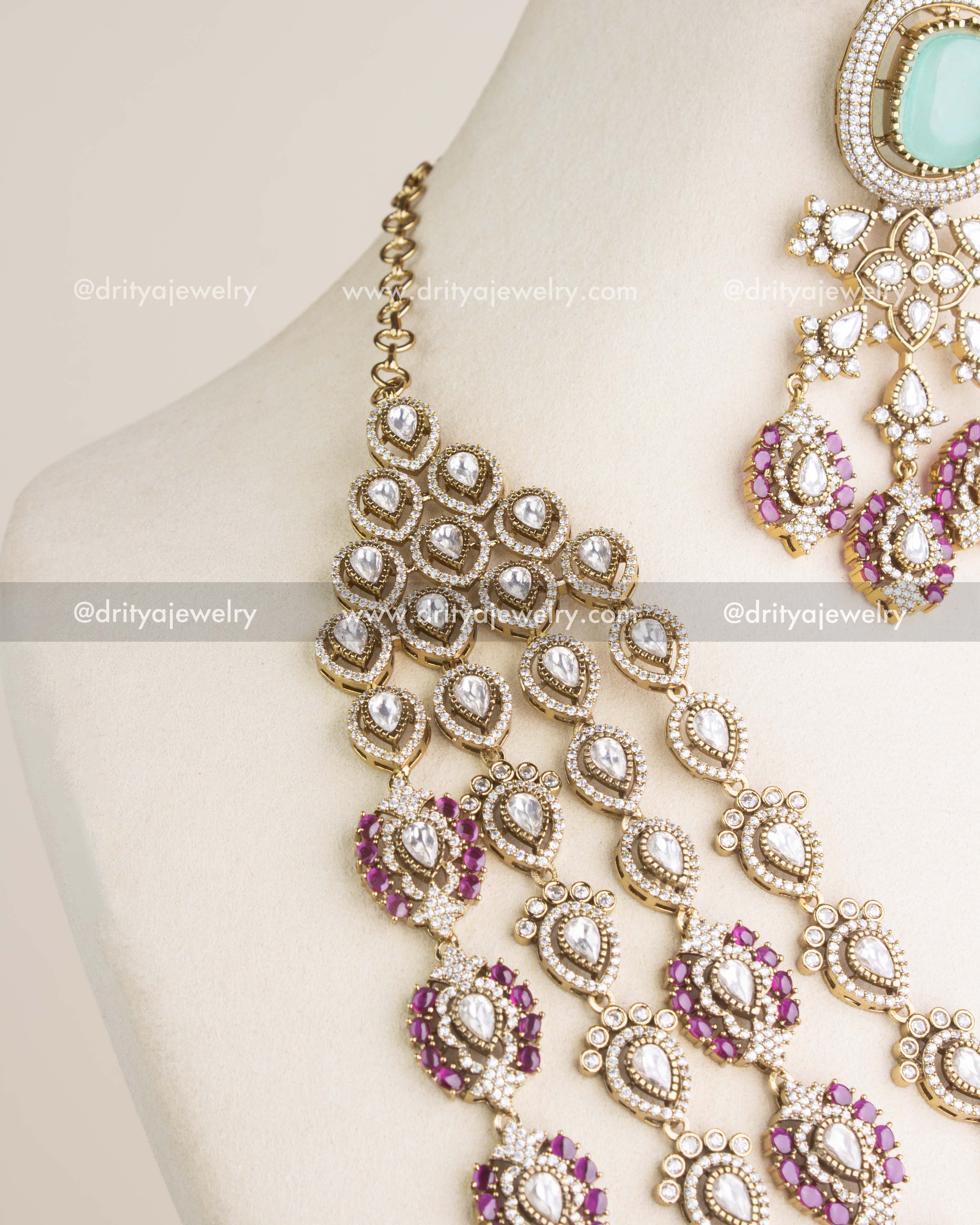 SKU 1131 Necklace Set angled view showing necklace layers and chain attachment on bust