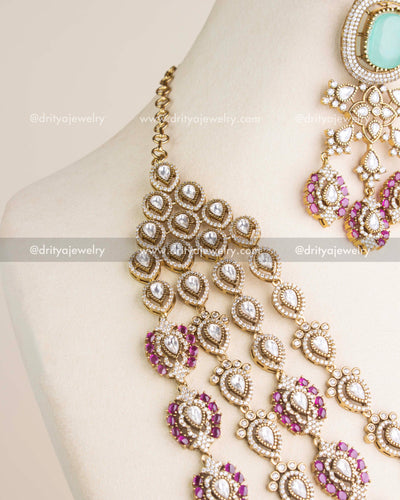 SKU 1131 Necklace Set angled view showing necklace layers and chain attachment on bust