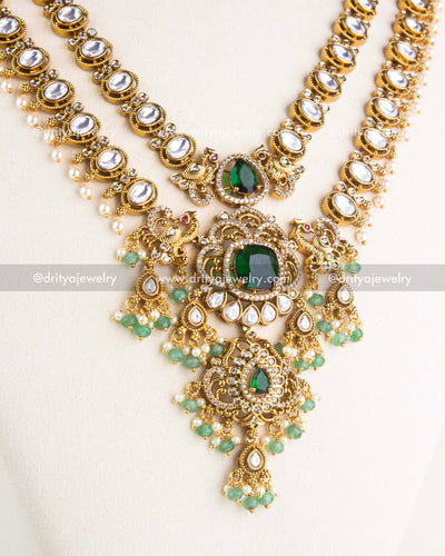 Detailed view of idol-inspired pendant with green stones and bead drops on layered necklace, SKU 1156-G - Necklace Set - Close View