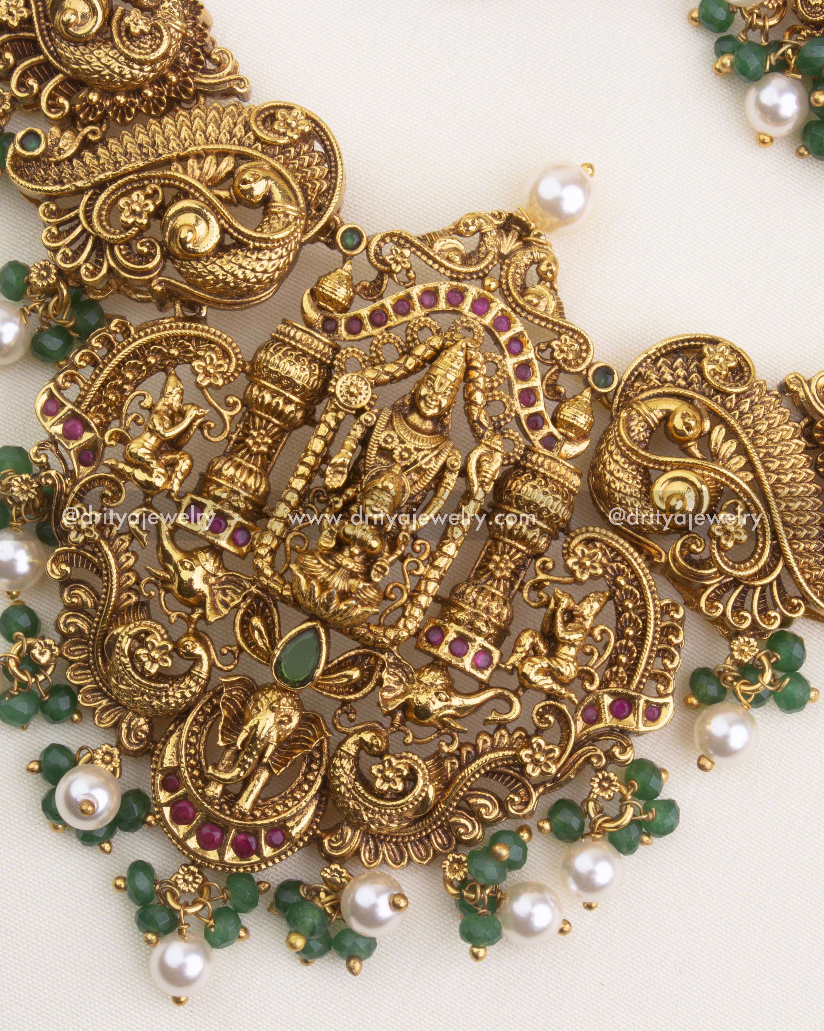 1203 - Close-up of Venkateswara Swamy temple pendant with green and pearl drops