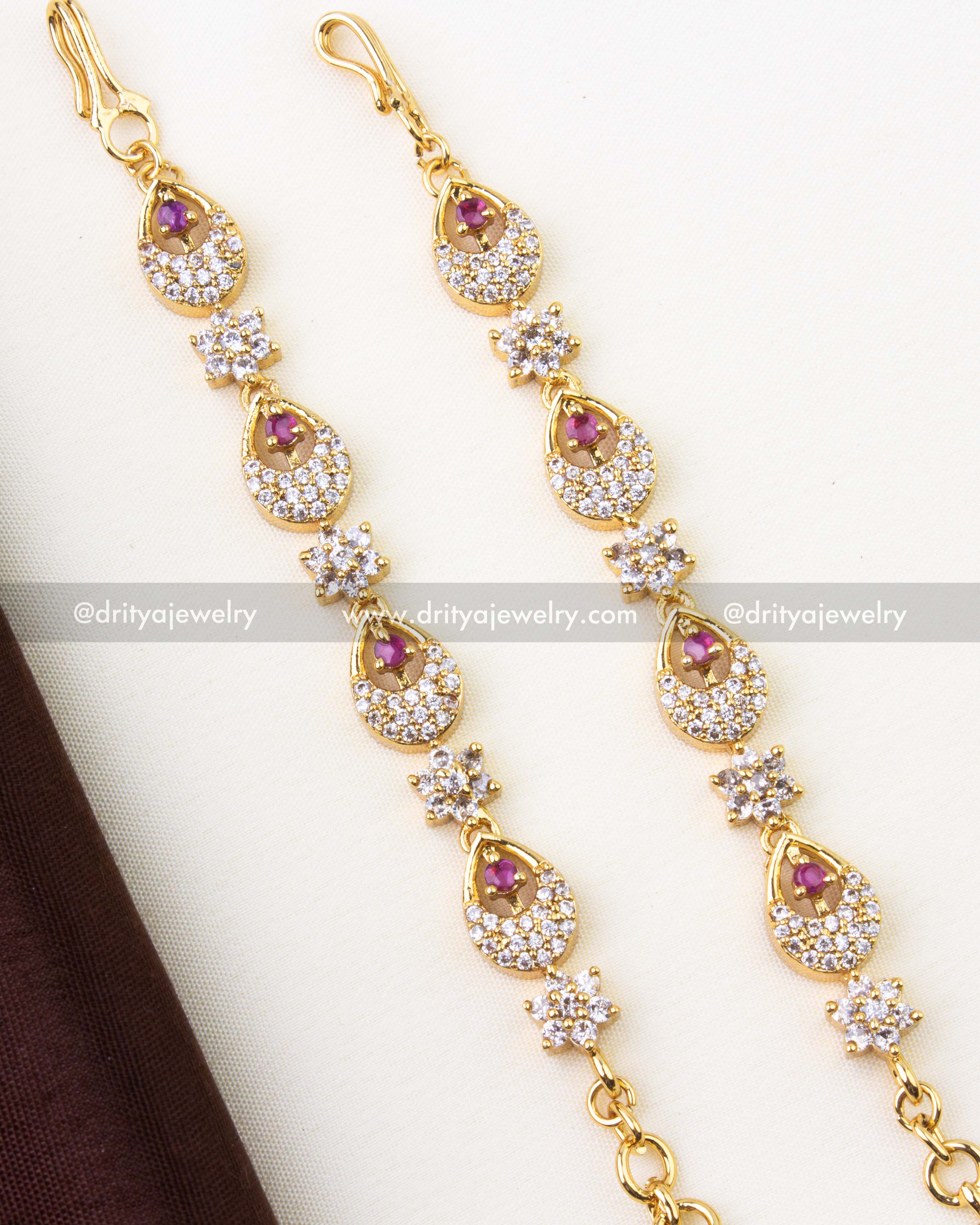 1302-R premium gold matilu hair chain with CZ and ruby-toned teardrop motifs close-up view