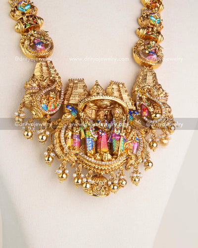 1220 Mid view of necklace focusing on temple pendant and surrounding motifs