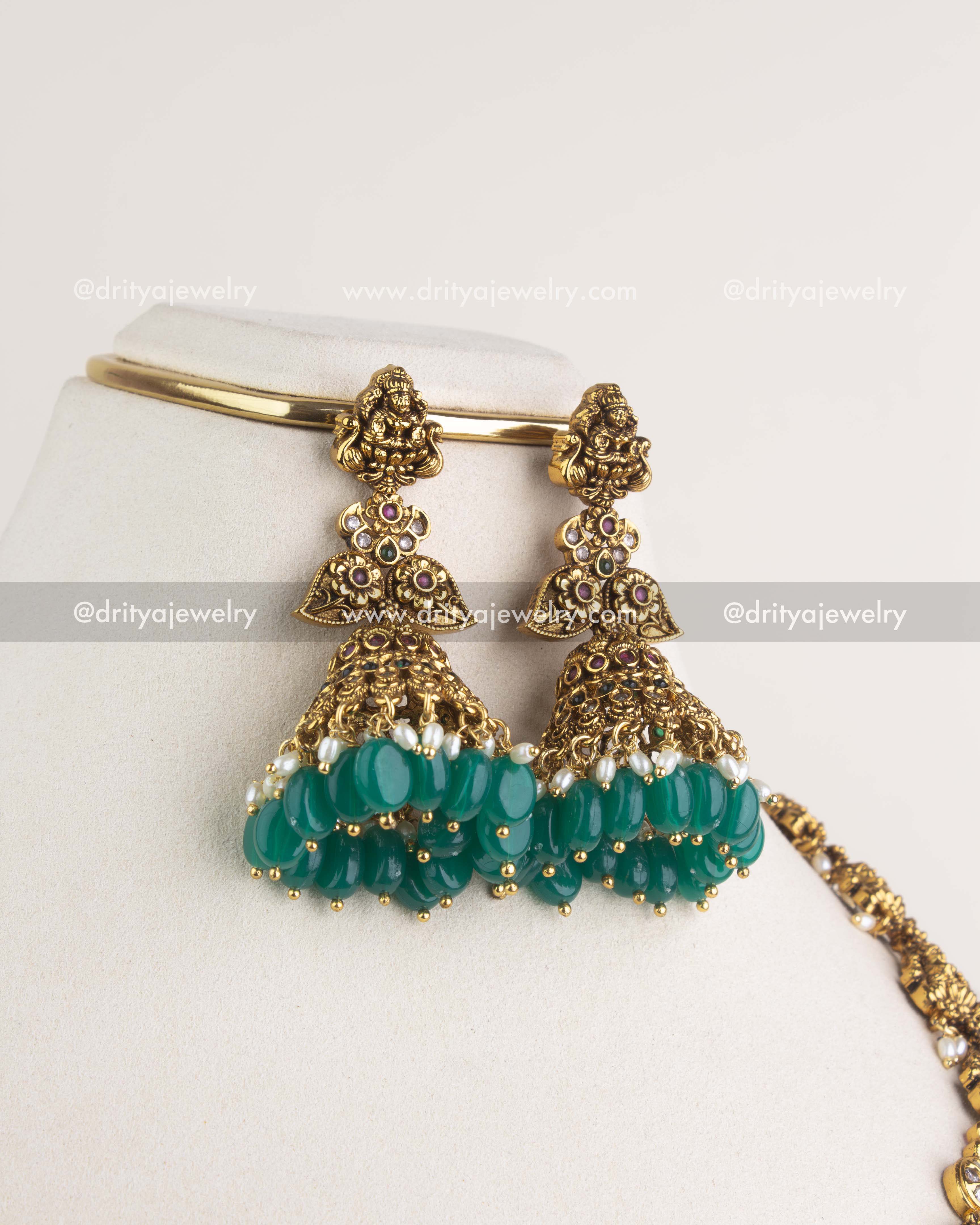 SKU 1164 Necklace Set matching jhumka earrings with god idol tops and clustered green bead drops.