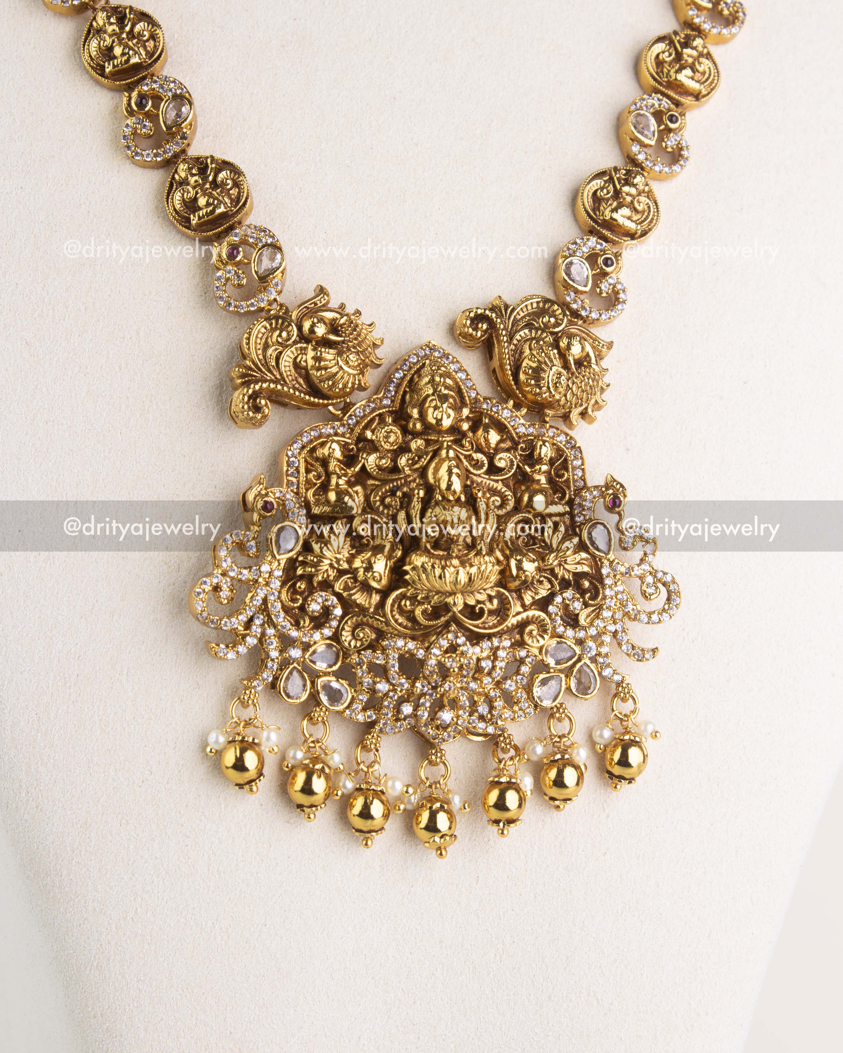 SKU 1189 Necklace Set detailed view of central god idol pendant with bead hangings