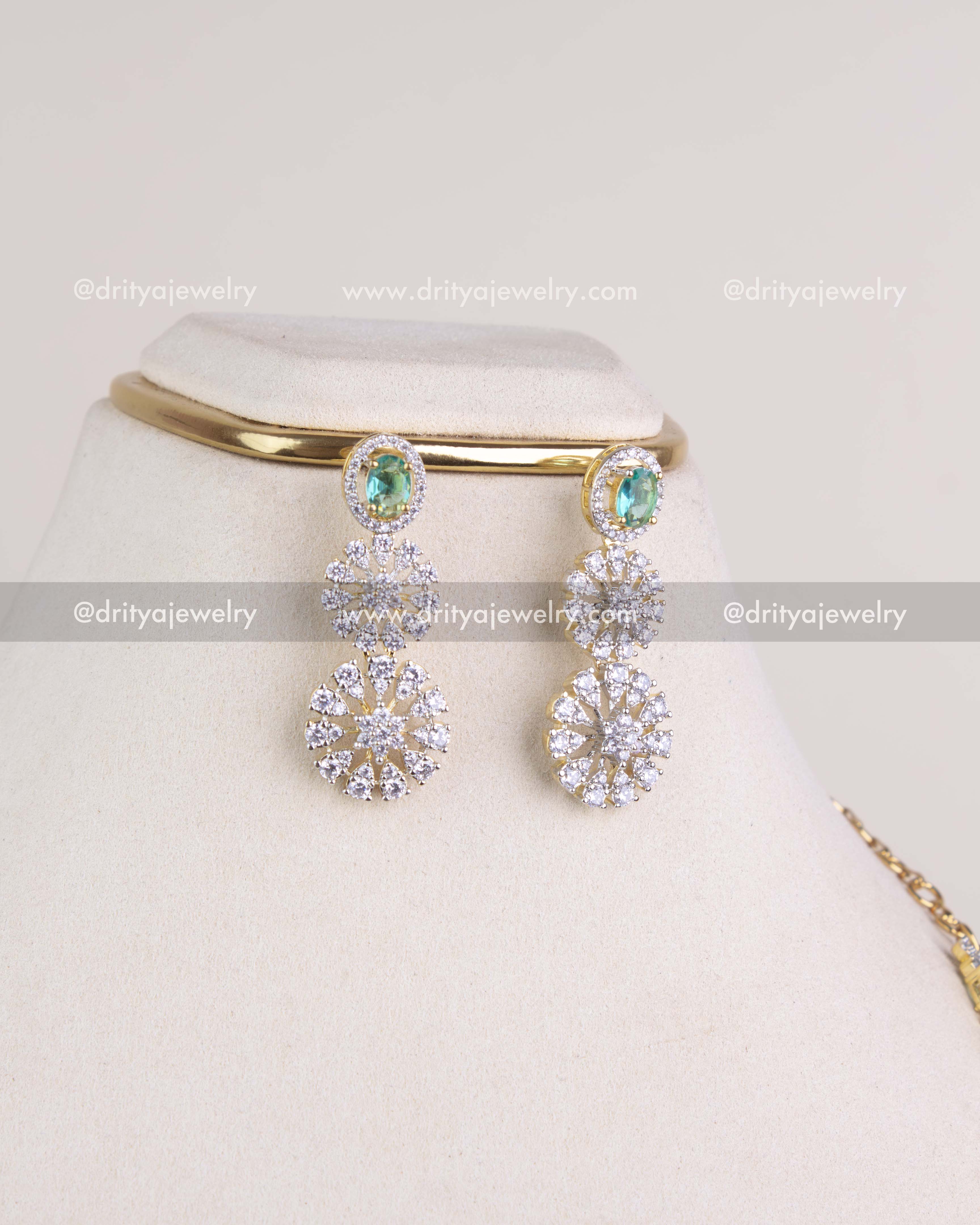 1215-RE matching emerald and CZ floral dangler earrings in dual-tone finish