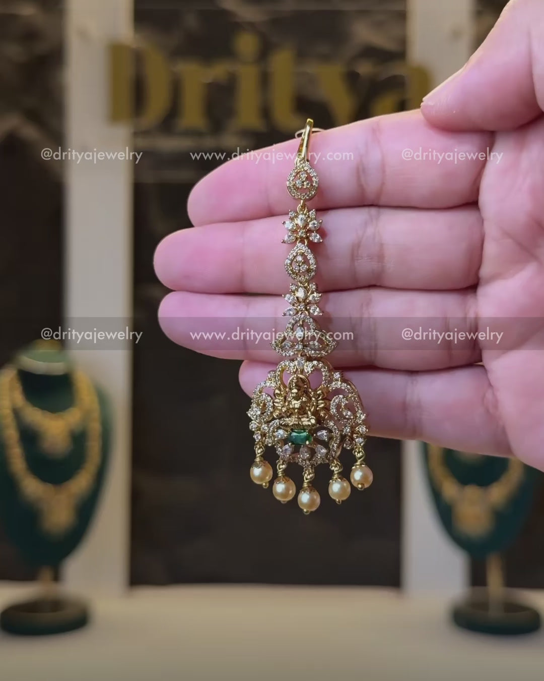 Load video: Premium Temple Maang Tikka with Green Stone &amp; CZ Detailing